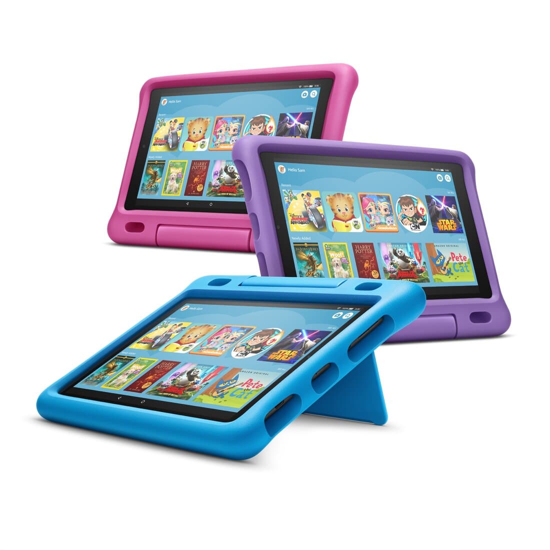 Three Fire HD 10 Kids Edition tablets in pink, purple, and blue kid-proof cases, all showing the same Amazon Kids home screen